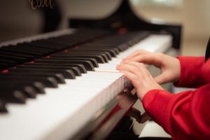 child playing the piano